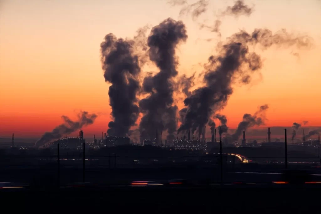 Power plant burning fossil fuels that release tons of carbon air pollution into the atmosphere.