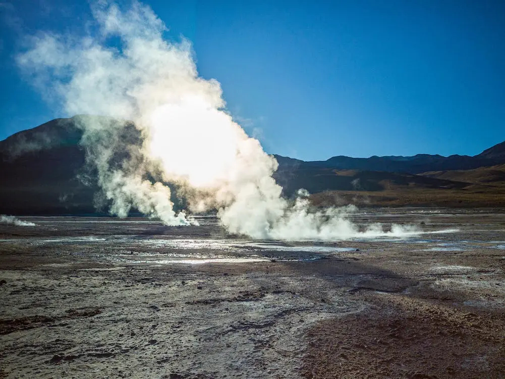 Geothermal spring in the desert. The steam can be harnessed to generate electricity.