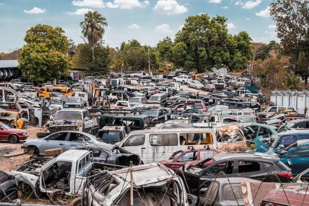 A junkyard full of old scrap cars that could be recycled for the steel and aluminum they contain.