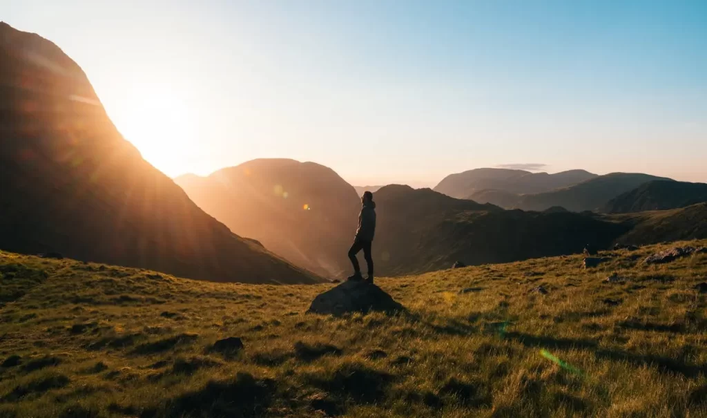 Man in a wide open space in England with not another person for miles challenging the idea that the planet is overpopulated.