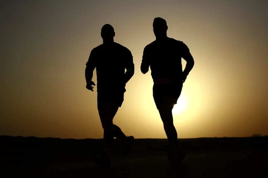 Two men running to stay fit and live longer