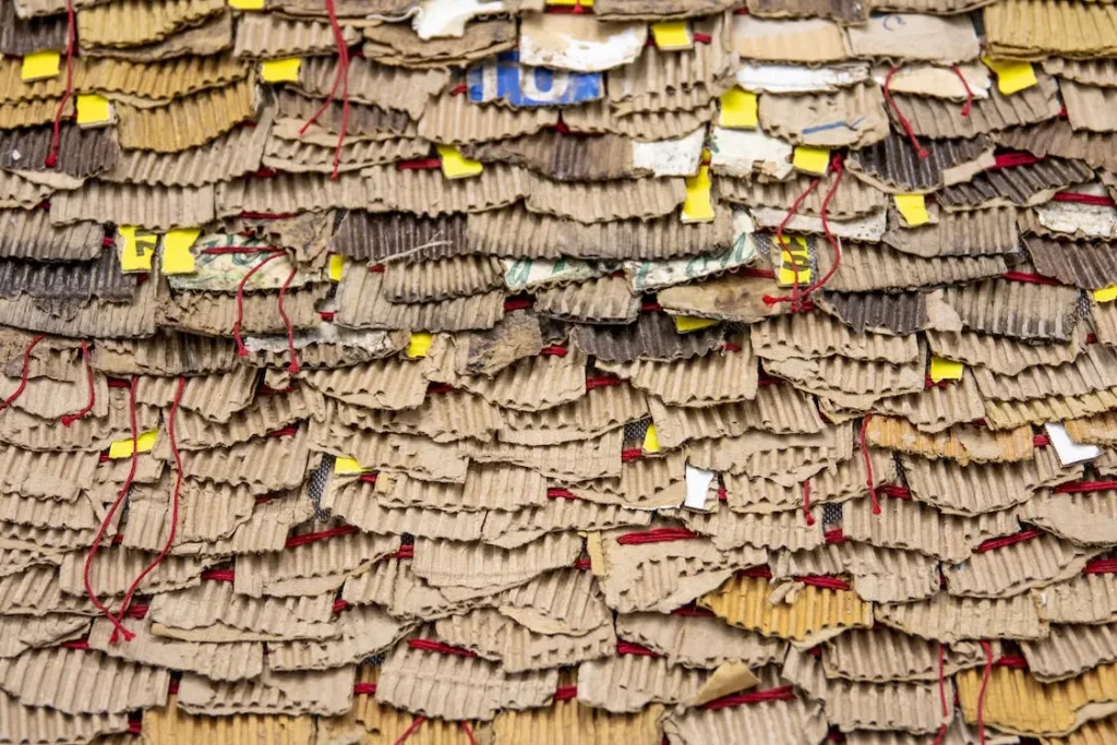 A pile of corrugated cardboard that can be recycled into new cardboard boxes.