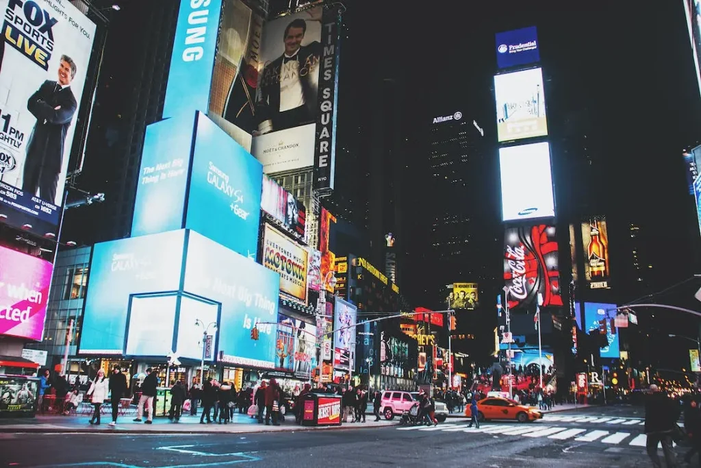 Times Square at night is still busy and full of noise pollution and light pollution.