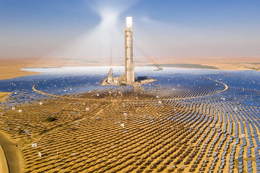 A concentrated solar field is a massive installation of hundreds of thousands of mirrors and a central receiver tower.