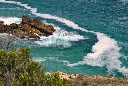 Rocks in the ocean tide along the rugged Pacific coastline